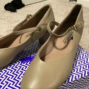 Tan heels. They are worn.